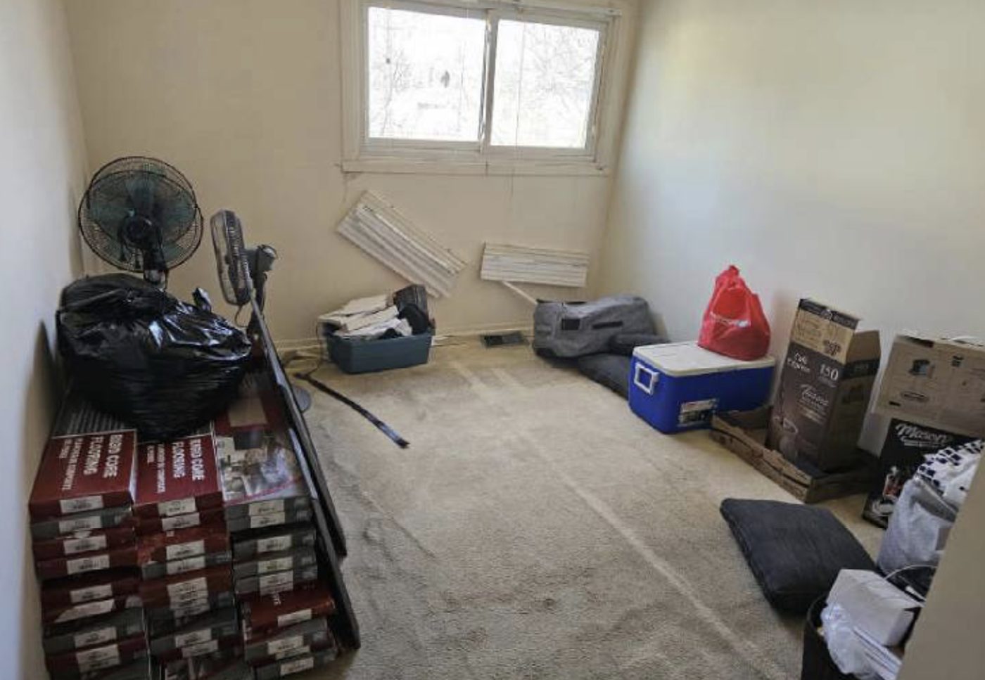 Bedroom before: worn carpet