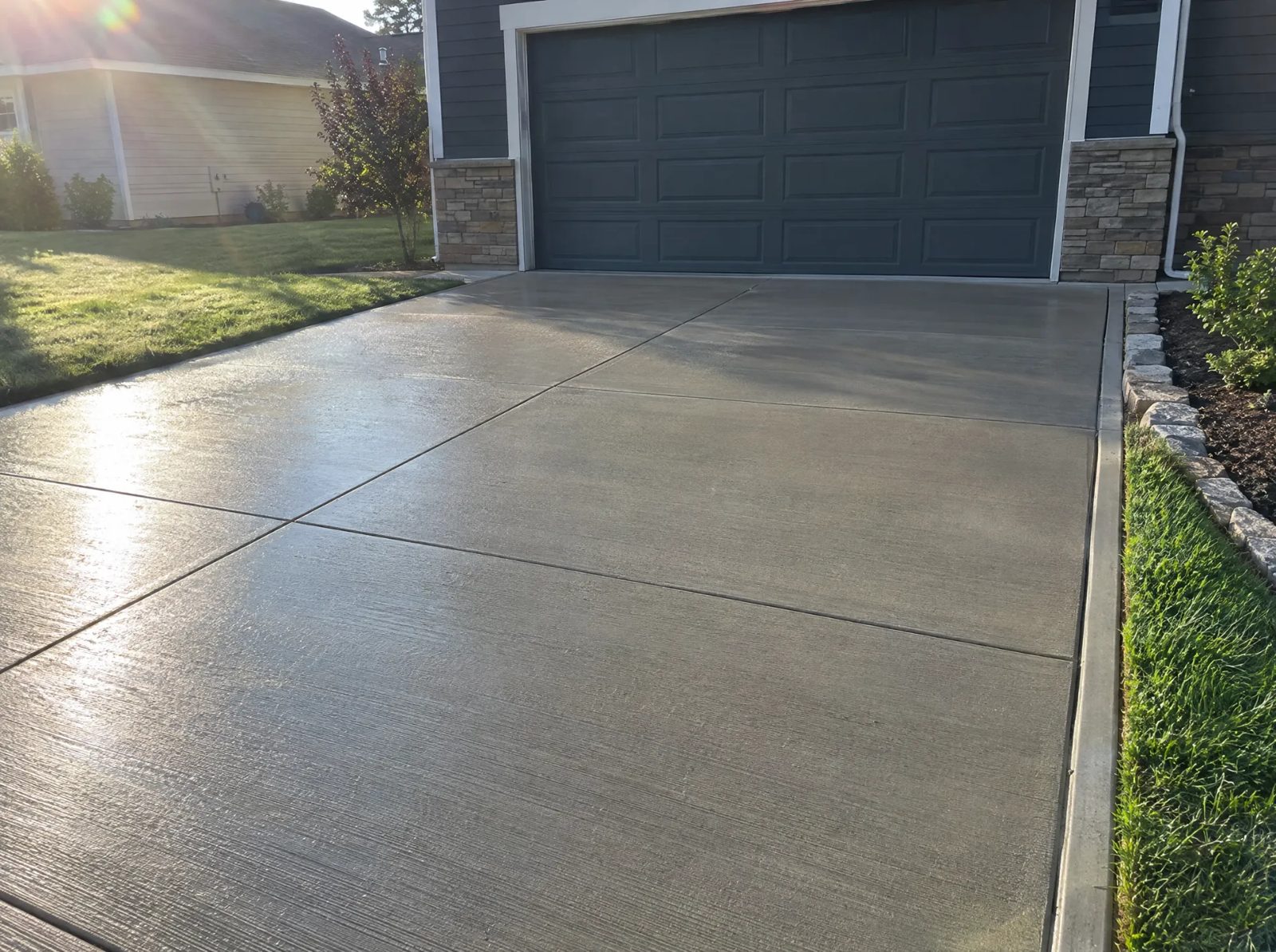 Broom-finished concrete driveway